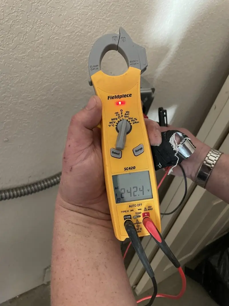Voltage testing with clamp meter during Electrical Installation Services in Fruitland Park